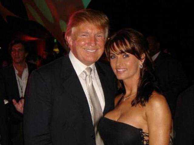 Playboy model Karen McDougal poses with Donald Trump